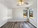 Bedroom featuring hardwood floors, neutral walls and a ceiling fan at 901 Chapman Cir, Stone Mountain, GA 30088