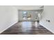 Bright living room featuring hardwood floors, large windows and neutral walls at 901 Chapman Cir, Stone Mountain, GA 30088