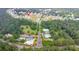 An aerial view of a residential neighborhood with a community center featuring tennis courts and a pool at 12 Ridgeline Nw Way, Cartersville, GA 30121