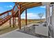Covered back patio featuring a lounge seating area, a wood table and a view at 12 Ridgeline Nw Way, Cartersville, GA 30121