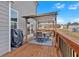 Back deck featuring a table, four chairs, covered gazebo, grill, and yard at 12 Ridgeline Nw Way, Cartersville, GA 30121