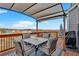 Back deck featuring a table, four chairs, covered gazebo, and view at 12 Ridgeline Nw Way, Cartersville, GA 30121