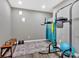 Basement with workout equipment, blue curtain, and rug on the floor at 12 Ridgeline Nw Way, Cartersville, GA 30121