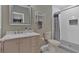 Bathroom with a mirror, vanity, toilet, and a tiled shower at 12 Ridgeline Nw Way, Cartersville, GA 30121
