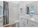 Well-lit bathroom with white vanity, shower with tub, and modern fixtures at 12 Ridgeline Nw Way, Cartersville, GA 30121