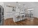 Modern kitchen featuring a center island, stainless steel appliances, and an adjacent breakfast area at 12 Ridgeline Nw Way, Cartersville, GA 30121
