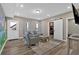 Comfortable living room featuring neutral decor, a sliding barn door, and a cozy atmosphere at 12 Ridgeline Nw Way, Cartersville, GA 30121