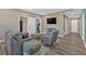Spacious living area featuring modern furnishings, a sliding barn door, and ample natural light at 12 Ridgeline Nw Way, Cartersville, GA 30121