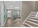 Inviting living room with a staircase to the side, comfortable seating, and stylish decor at 12 Ridgeline Nw Way, Cartersville, GA 30121