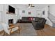 Spacious living room featuring a fireplace, hardwood floors, and comfortable seating at 12 Ridgeline Nw Way, Cartersville, GA 30121