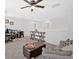 Relaxing loft area with comfortable seating, desk and ceiling fan at 12 Ridgeline Nw Way, Cartersville, GA 30121