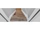 Staircase view with wood treads, white risers, and modern design at 12 Ridgeline Nw Way, Cartersville, GA 30121