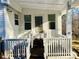 Back porch with steps, railing, and privacy, perfect for relaxing outdoors at 140 Thrasher Rd, Covington, GA 30016