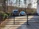 Gated driveway showcasing parking for two vehicles and easy access to the residence at 140 Thrasher Rd, Covington, GA 30016