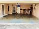 Spacious garage with ample room for storage, work area, and a television for entertainment at 140 Thrasher Rd, Covington, GA 30016
