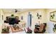 Spacious living room with ceiling fan, tv, comfortable seating, and natural light at 140 Thrasher Rd, Covington, GA 30016
