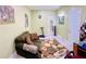 A cozy home office setup with a comfortable sofa and practical desk space at 140 Thrasher Rd, Covington, GA 30016