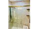 Updated shower with multi-spray fixtures, built-in bench and glass door at 140 Thrasher Rd, Covington, GA 30016