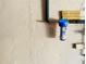 Close up of blue water filter attached to wall with pipes at 140 Thrasher Rd, Covington, GA 30016