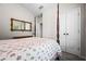 Cozy bedroom with four poster bed, carpet floors, and ensuite bathroom at 330 Abbey Ct, Canton, GA 30115