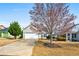 Well-maintained home with mature trees, long driveway, and attached garage at 330 Abbey Ct, Canton, GA 30115