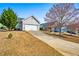 Charming one-story home with a well-manicured lawn and an inviting driveway at 330 Abbey Ct, Canton, GA 30115