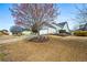 Attractive home with landscaped yard and an inviting driveway at 330 Abbey Ct, Canton, GA 30115