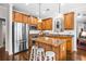 Modern kitchen with stainless steel appliances, granite countertops and a kitchen island at 330 Abbey Ct, Canton, GA 30115