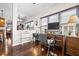 Comfortable home office featuring a wooden desk, natural light, and convenient access to other areas of the house at 330 Abbey Ct, Canton, GA 30115