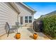 A concrete patio featuring outdoor seating and a grill, perfect for relaxing and entertaining at 330 Abbey Ct, Canton, GA 30115