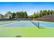 Community amenities include well-maintained tennis courts surrounded by trees at 330 Abbey Ct, Canton, GA 30115