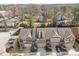 Aerial view showcases the home's roof, garage, and landscaping in a residential neighborhood at 2286 Emerald Sky Dr, Smyrna, GA 30080