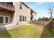 Spacious backyard with a lawn and fence, offering a private outdoor space at 2286 Emerald Sky Dr, Smyrna, GA 30080