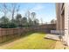 Backyard with green grass and a privacy fence, perfect for outdoor activities and relaxation at 2286 Emerald Sky Dr, Smyrna, GA 30080