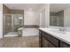 Luxurious bathroom featuring a soaking tub, glass-enclosed shower, and modern vanity at 2286 Emerald Sky Dr, Smyrna, GA 30080