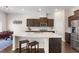 Modern kitchen featuring stainless steel appliances, quartz countertops, and a center island at 2286 Emerald Sky Dr, Smyrna, GA 30080