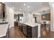 Bright kitchen with island, stainless steel appliances, and open layout to the dining area at 2286 Emerald Sky Dr, Smyrna, GA 30080