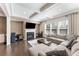 Inviting living room with coffered ceilings, fireplace, and large windows at 2286 Emerald Sky Dr, Smyrna, GA 30080
