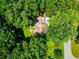 Secluded home surrounded by lush greenery and mature trees, offering privacy and a peaceful setting at 277 Hope Dr, Dallas, GA 30157