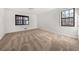 Comfortable bedroom with neutral carpet, two windows for natural light, and closet space at 277 Hope Dr, Dallas, GA 30157