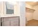Tastefully updated bathroom with marble vanity and ample storage at 256 Olde Oaks Ln, Riverdale, GA 30274