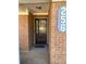 Close up of the home's brick facade and ornate security gate at 256 Olde Oaks Ln, Riverdale, GA 30274