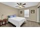 Inviting bedroom features neutral walls, carpet floors, and a bed centered near the window at 3608 Stedman Pl, Duluth, GA 30096
