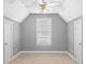 Bedroom with neutral color, carpet and a window between two doors at 770 Huiet Dr, Mcdonough, GA 30252