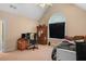 Bedroom with unique arched window, closet armoire, and carpeted floor at 770 Huiet Dr, Mcdonough, GA 30252