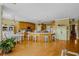 Inviting kitchen with island seating and access to the dining area at 770 Huiet Dr, Mcdonough, GA 30252