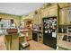 Kitchen features granite countertops, modern appliances, and tile backsplash at 770 Huiet Dr, Mcdonough, GA 30252