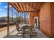 Charming outdoor patio with brick walls, seating, and covered area for entertaining at 770 Huiet Dr, Mcdonough, GA 30252