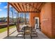 Charming outdoor patio with brick walls, seating, and covered area for entertaining at 770 Huiet Dr, Mcdonough, GA 30252