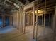 Spacious unfinished basement with exposed framing, offering endless possibilities at 949 Nevis Way, Mcdonough, GA 30253